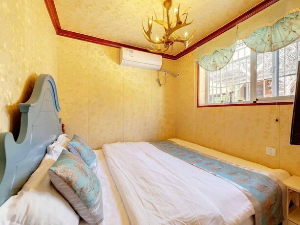 Imagen de la habitación del Hotel Unwind Moments Inn - Gubei Water Town. Foto 19