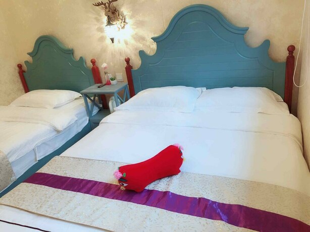 Imagen de la habitación del Hotel Unwind Moments Inn - Gubei Water Town. Foto 22