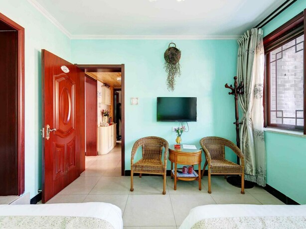 Imagen de la habitación del Hotel Unwind Moments Inn - Gubei Water Town. Foto 28