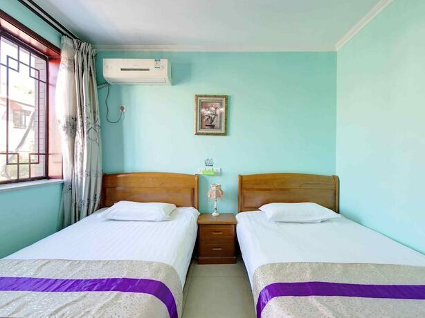 Imagen de la habitación del Hotel Unwind Moments Inn - Gubei Water Town. Foto 31