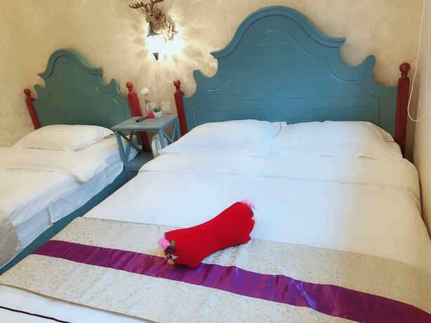 Imagen de la habitación del Hotel Unwind Moments Inn - Gubei Water Town. Foto 33