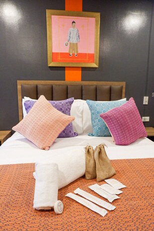 Imagen de la habitación del Hotel Unwnd Flats Makati. Foto 4