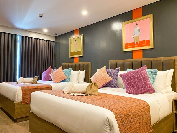 Imagen de la habitación del Hotel Unwnd Flats Makati. Foto 6