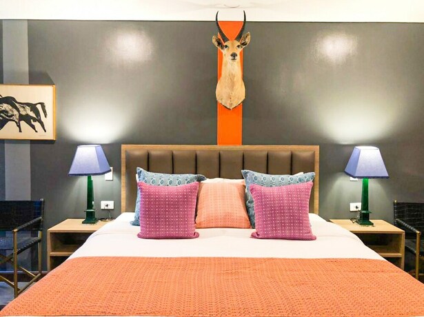 Imagen de la habitación del Hotel Unwnd Flats Makati. Foto 7