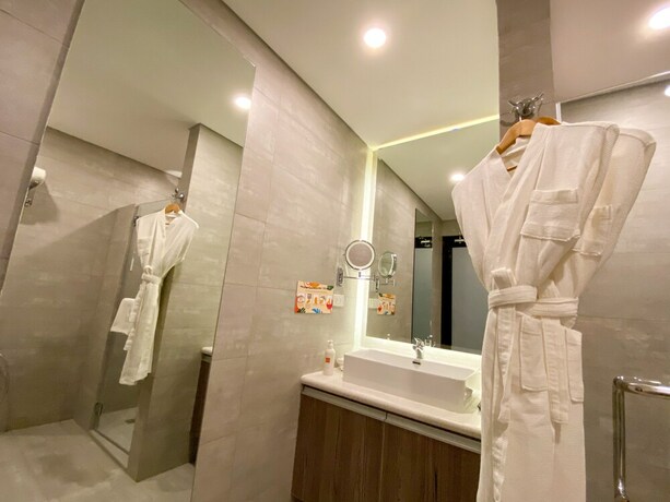 Imagen de la habitación del Hotel Unwnd Flats Makati. Foto 8