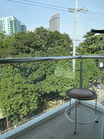 Imagen de la habitación del Hotel Unwnd Flats Makati. Foto 11