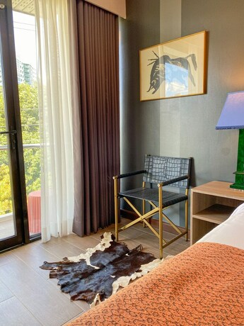 Imagen de la habitación del Hotel Unwnd Flats Makati. Foto 12