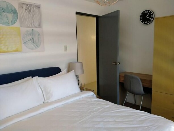 Imagen de la habitación del Hotel Unwnd Residences Dumaguete. Foto 13