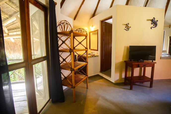 Imagen de la habitación del Hotel Uolis Nah Villas. Foto 3