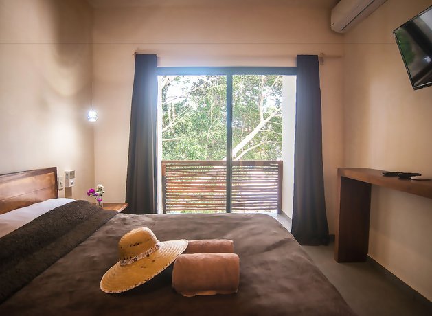 Imagen de la habitación del Hotel Uolis Nah Villas. Foto 4