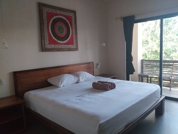 Imagen de la habitación del Hotel Uolis Nah Villas. Foto 5
