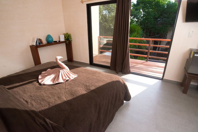 Imagen de la habitación del Hotel Uolis Nah Villas. Foto 8