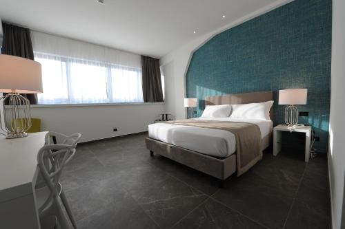 Imagen de la habitación del Hotel Up Museum - Wellness and Spa. Foto 9