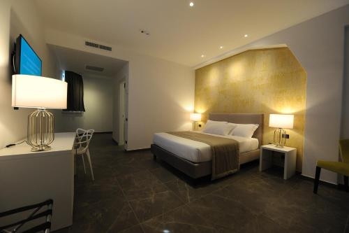 Imagen de la habitación del Hotel Up Museum - Wellness and Spa. Foto 10