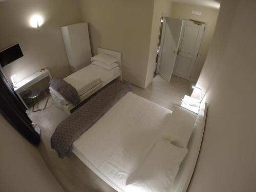 Imagen de la habitación del Hotel Up, Napoles Ciudad. Foto 9