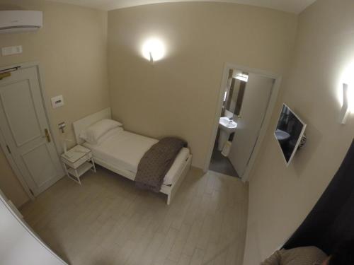 Imagen de la habitación del Hotel Up, Napoles Ciudad. Foto 10