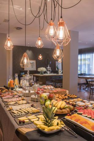 Imagen del bar/restaurante del Hotel Up Rooms Vic. Foto 2