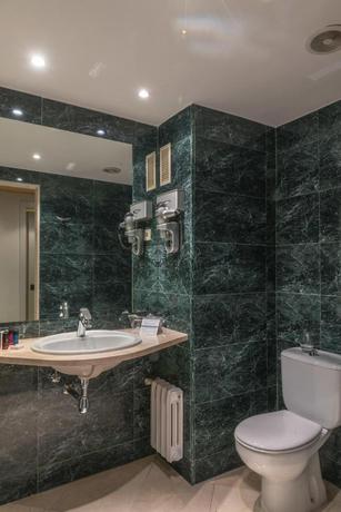 Imagen de la habitación del Hotel Up Rooms Vic. Foto 12