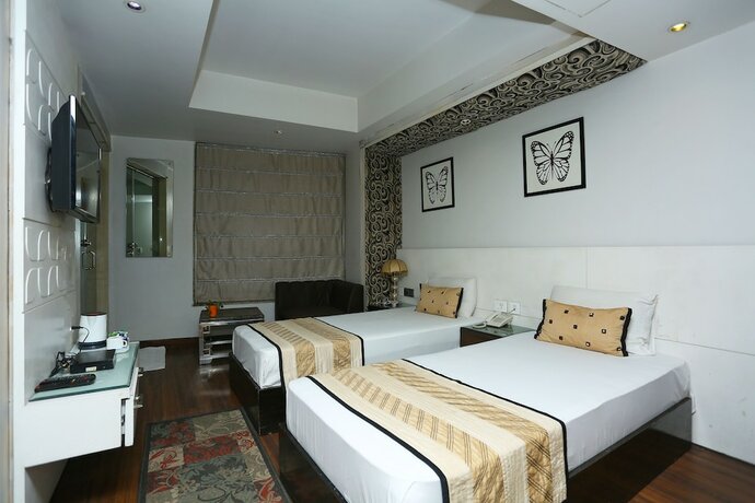 Imagen de la habitación del Hotel Uppal International. Foto 19