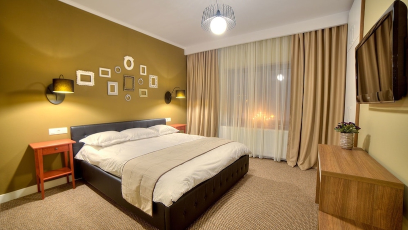 Imagen de la habitación del Hotel UpperHouse Brasov. Foto 2