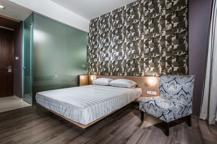 Imagen de la habitación del Hotel Upscale Suites. Foto 8