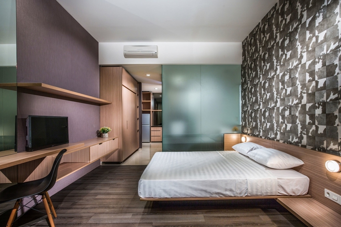 Imagen de la habitación del Hotel Upscale Suites. Foto 9