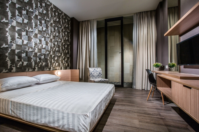 Imagen de la habitación del Hotel Upscale Suites. Foto 10