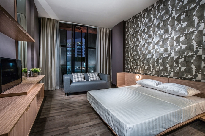 Imagen de la habitación del Hotel Upscale Suites. Foto 11