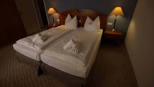 Imagen de la habitación del Hotel Upstalsboom Seehotel. Foto 15