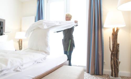 Imagen de la habitación del Hotel Upstalsboomresidenz & SPA K&uuml;hlungsborn. Foto 8