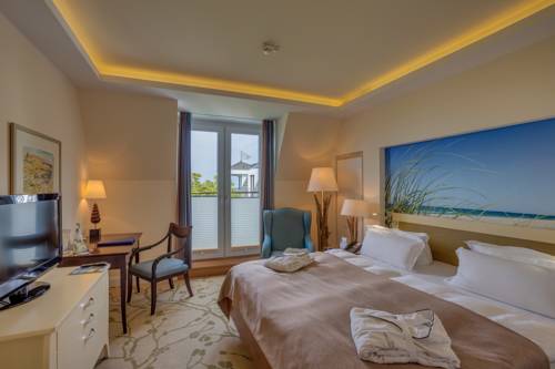 Imagen de la habitación del Hotel Upstalsboomresidenz & SPA K&uuml;hlungsborn. Foto 14