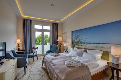 Imagen de la habitación del Hotel Upstalsboomresidenz & SPA K&uuml;hlungsborn. Foto 15