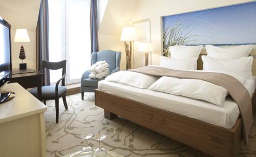 Imagen de la habitación del Hotel Upstalsboomresidenz & SPA K&uuml;hlungsborn. Foto 16