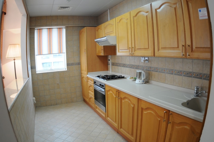 Imagen de la habitación del Hotel Uptown Apartments Abu Dhabi. Foto 10