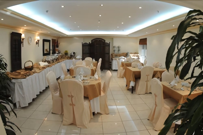 Imagen del bar/restaurante del Hotel Uptown Apartments Abu Dhabi. Foto 5