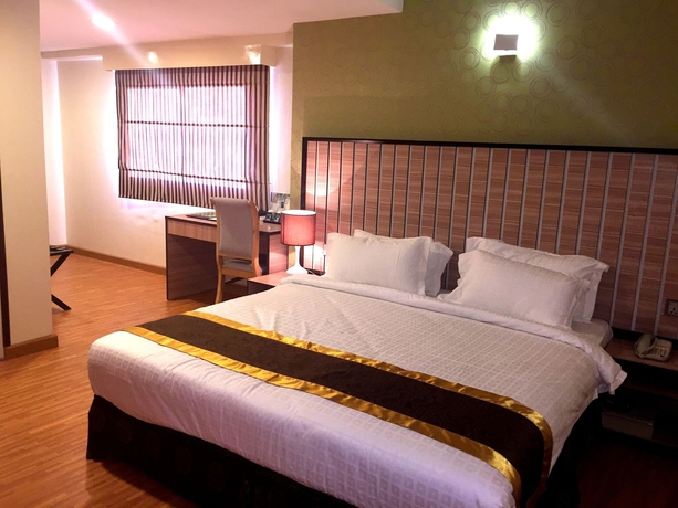 Imagen de la habitación del Hotel Uptown. Foto 3