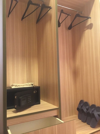 Imagen de la habitación del Hotel Uptown. Foto 11