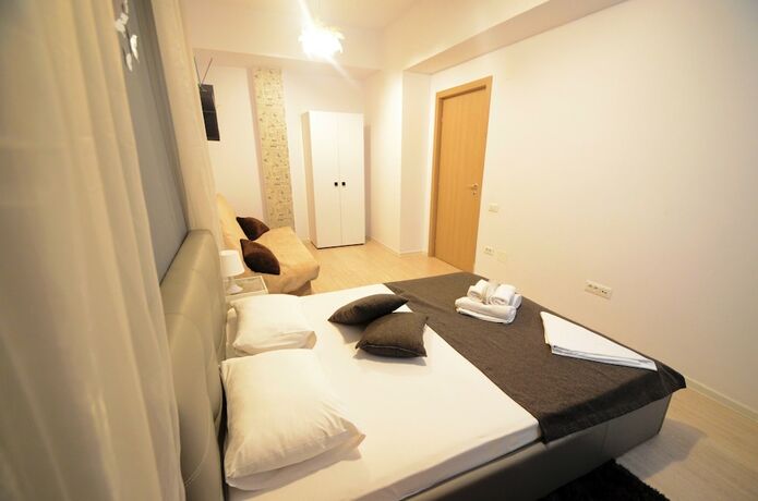 Imagen de la habitación del Hotel Uptown Residence Apartments. Foto 18