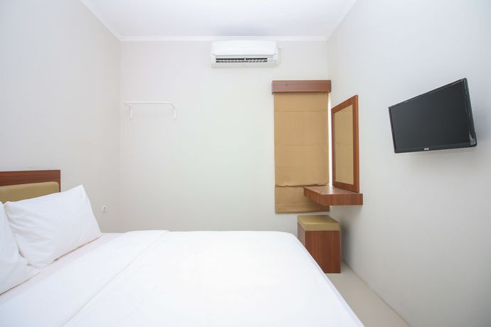 Imagen de la habitación del Hotel Uptown Residence. Foto 2