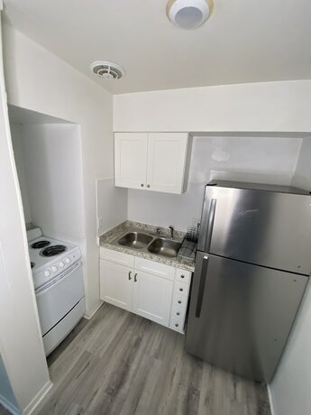 Imagen de la habitación del Hotel Uptown Suites. Foto 11
