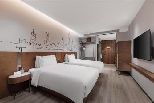 Imagen de la habitación del Hotel UrCove By Hyatt ShenZhen Futian Port. Foto 16