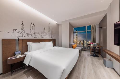 Imagen de la habitación del Hotel UrCove By Hyatt ShenZhen Futian Port. Foto 18