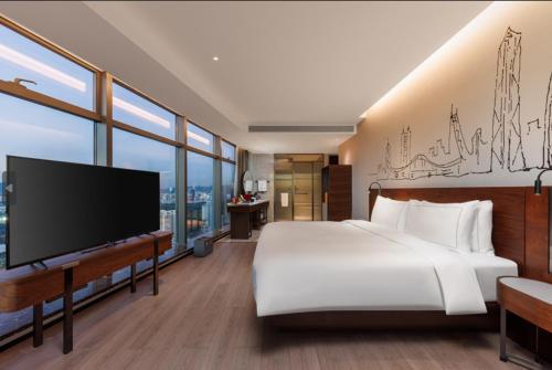 Imagen de la habitación del Hotel UrCove By Hyatt ShenZhen Futian Port. Foto 19