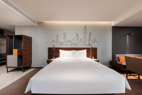 Imagen de la habitación del Hotel UrCove By Hyatt ShenZhen Futian Port. Foto 20