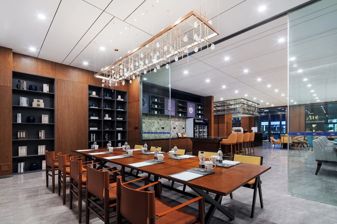 Imagen de los interiores del Hotel UrCove By Hyatt Yangzhou Dongguan Street. Foto 12