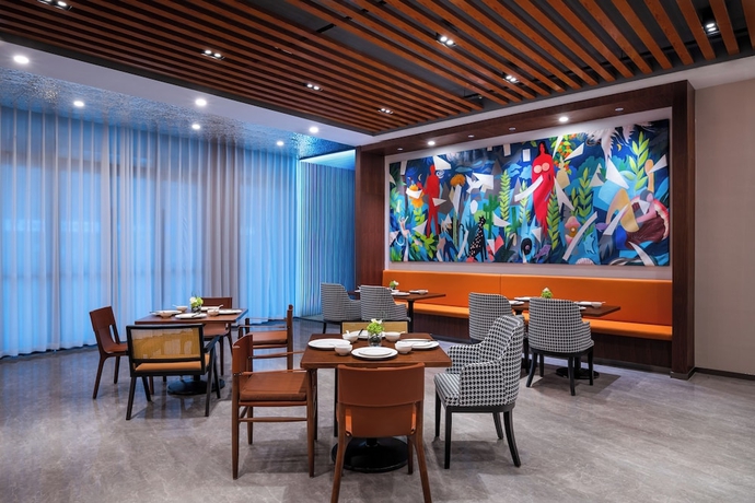 Imagen del bar/restaurante del Hotel UrCove By Hyatt Yangzhou Dongguan Street. Foto 3