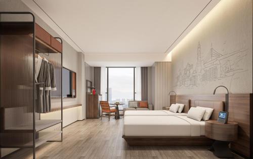 Imagen de la habitación del Hotel UrCove Shantou Yifei Zhugang New City Branch. Foto 16