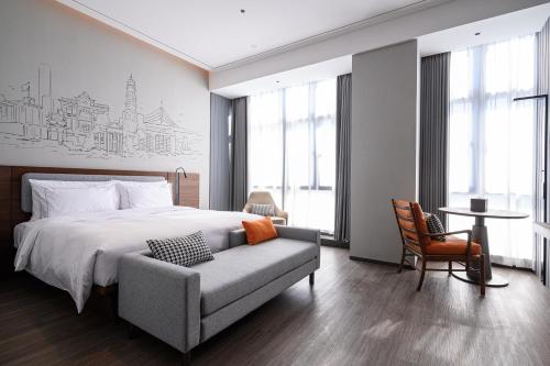 Imagen de la habitación del Hotel UrCove Shantou Yifei Zhugang New City Branch. Foto 20