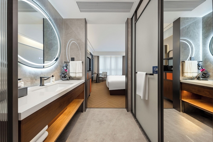 Imagen de la habitación del Hotel UrCove Yangzhou China Grand Canal Museum. Foto 3