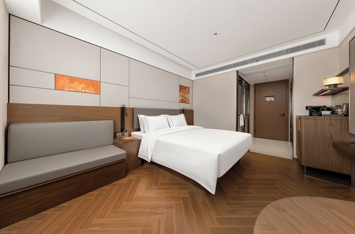 Imagen de la habitación del Hotel UrCove Yangzhou China Grand Canal Museum. Foto 8